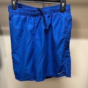 Nike Blue Shorts

COULD BE USED AS SHORTS OR SWIM TRUNKS